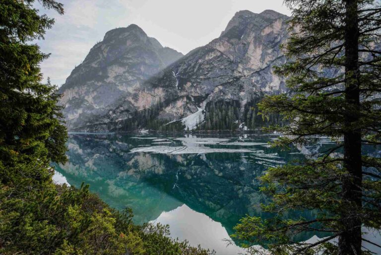 Nature Background Image showing a mountainous lake with trees on the side For Doctor Dutch Online Cannabis Dispensary Canada